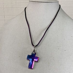 Holographic cross pendant on deep purple satin necklace